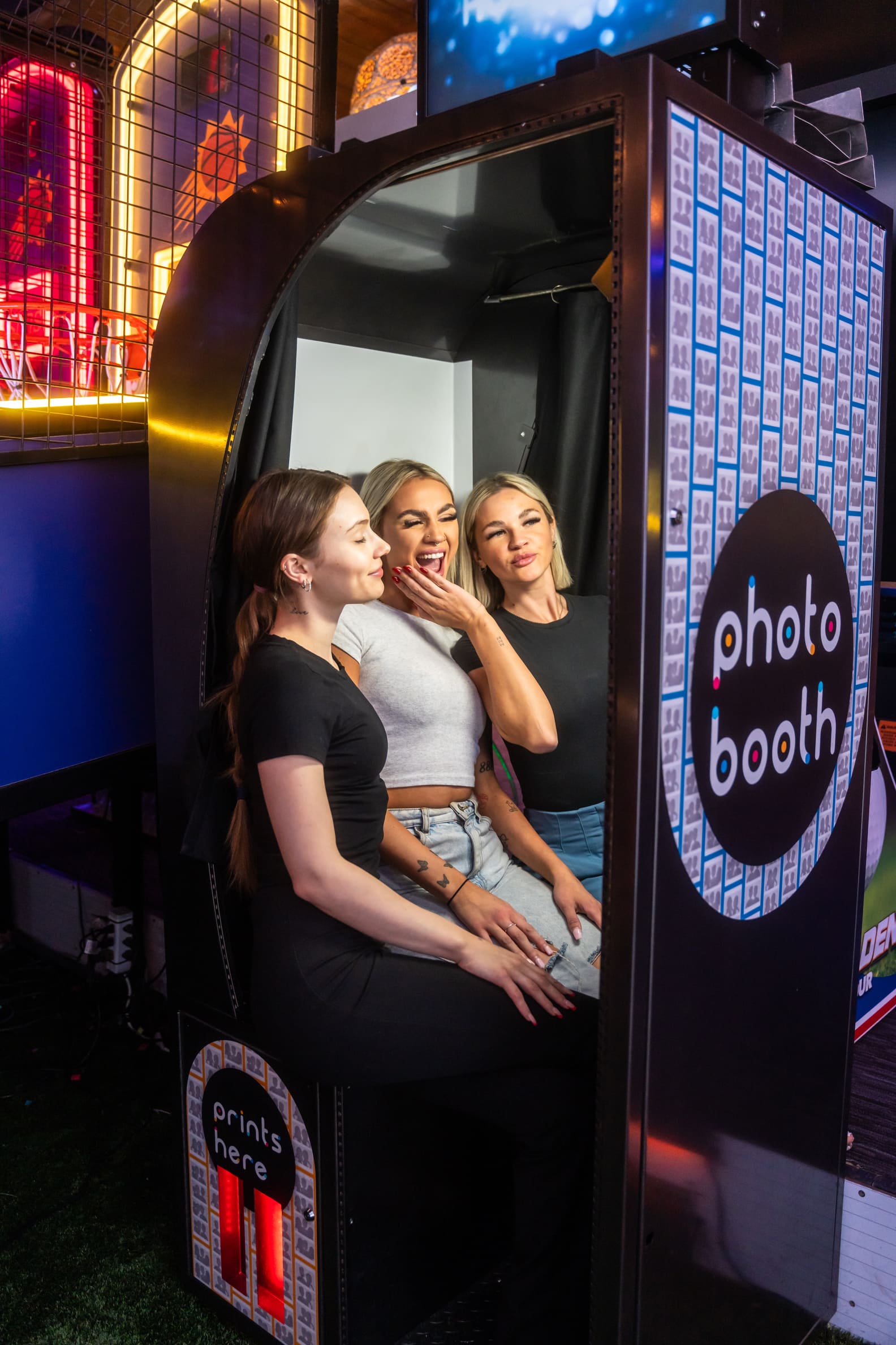 group of friends at the photo booth in Casa Amigos